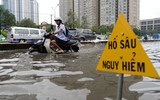 [ẢNH] Những kỹ năng lái xe an toàn khi trời mưa, ngập úng